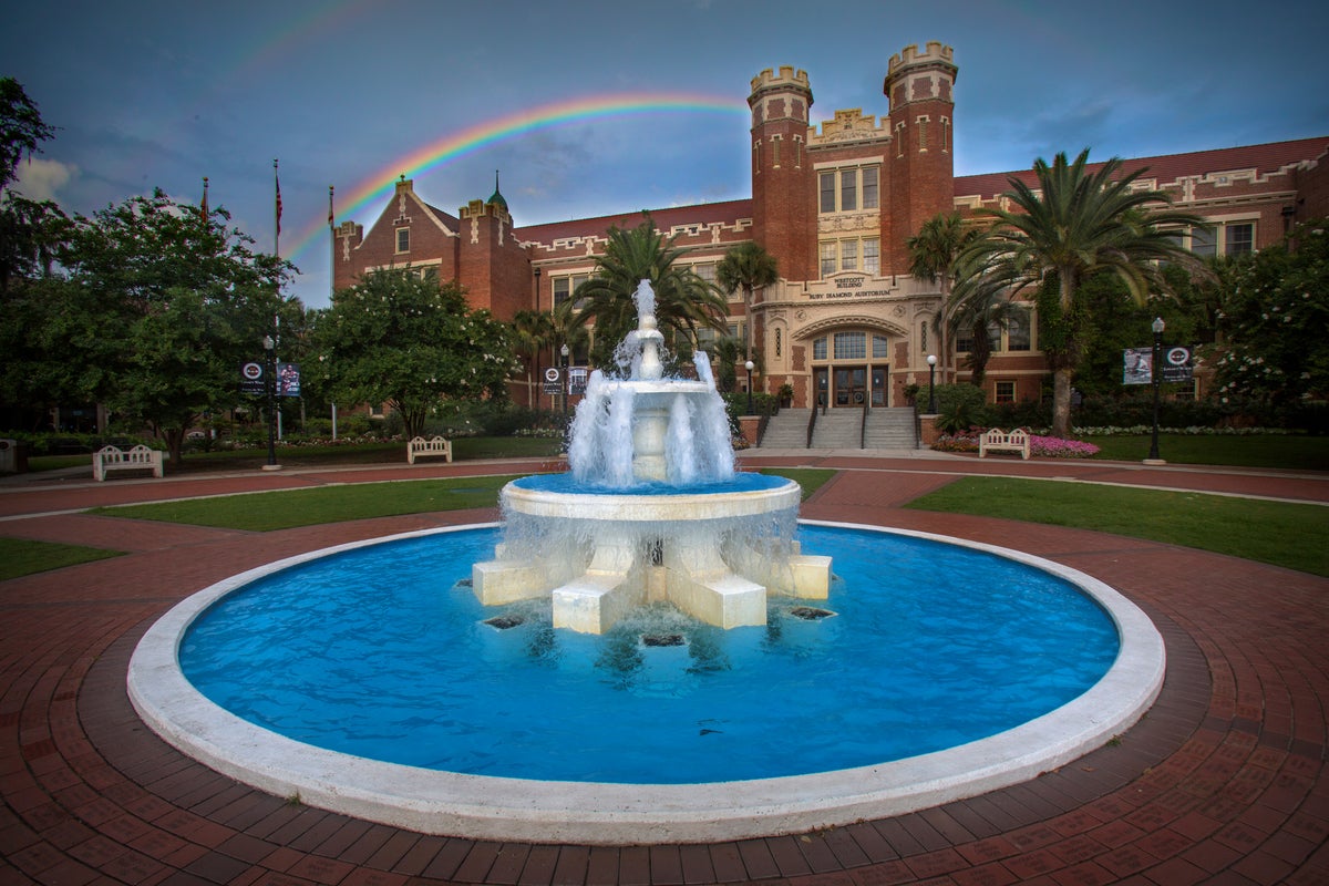 photo of Westcott building with rainbow behind the fountain
